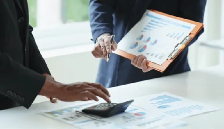 Team of business professionals working together in UAE